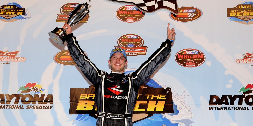 Daniel Suarez celebrates in victory lane after winning the NASCAR K&N Pro Series East UNOH Battle at the Beach race (photo - Patrick Smith/Getty Images for NASCAR)